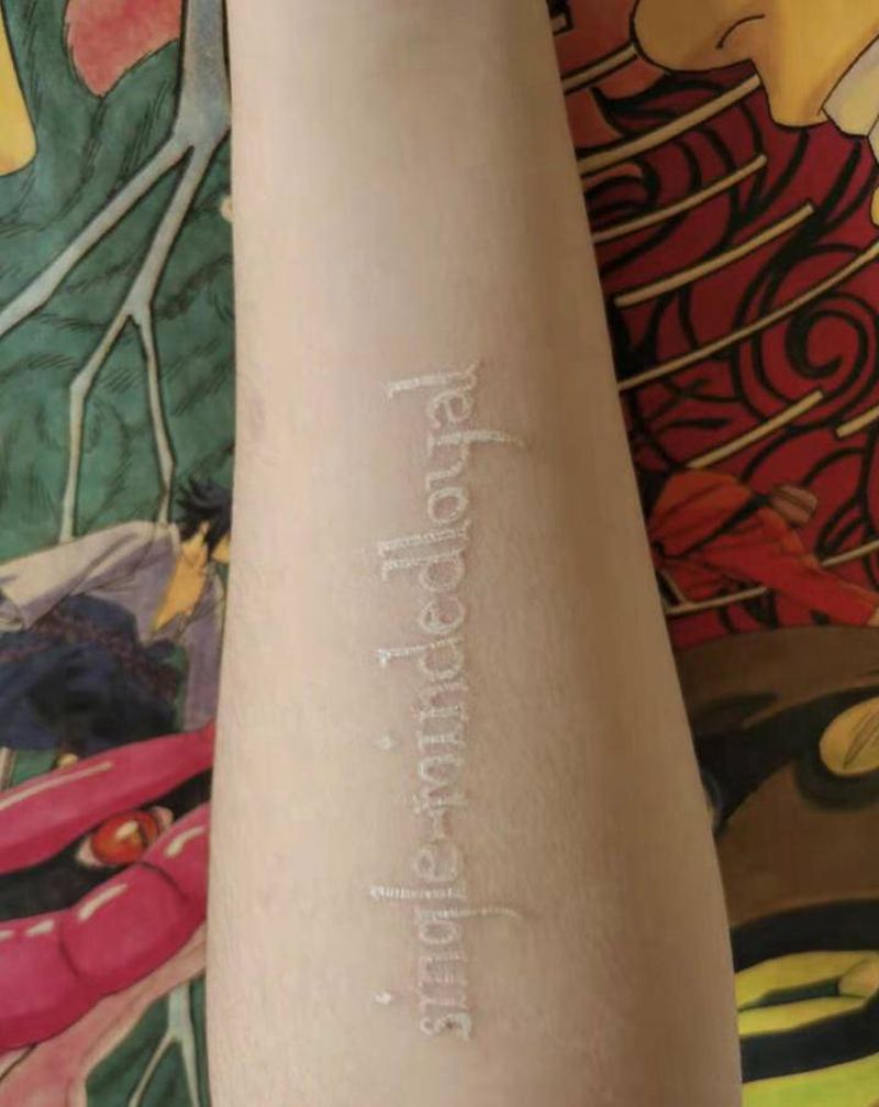 近日纹身图片_手臂纹身图案