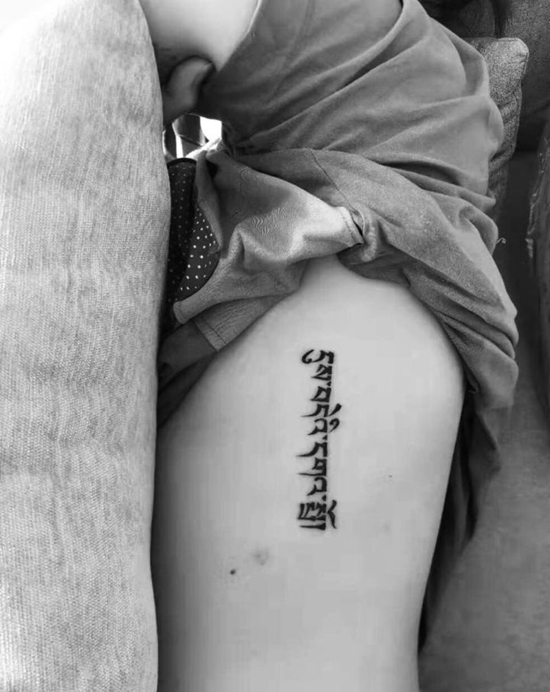 近日纹身图片_腰部纹身图案