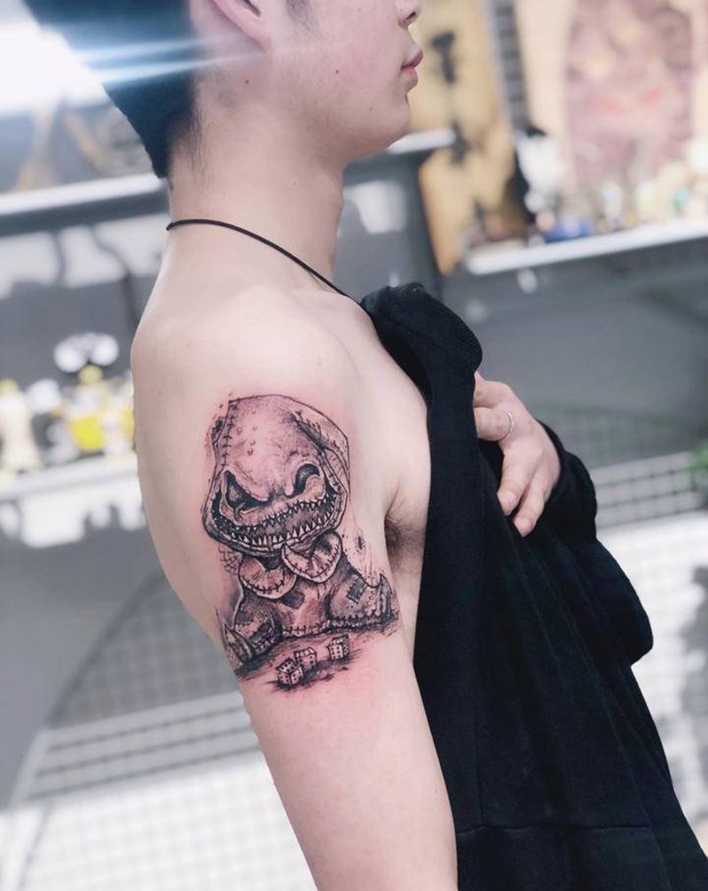 巫毒娃娃纹身图片_手臂点刺New School纹身图案