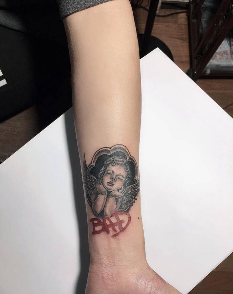 天使纹身图片_手臂欧美写实纹身图案