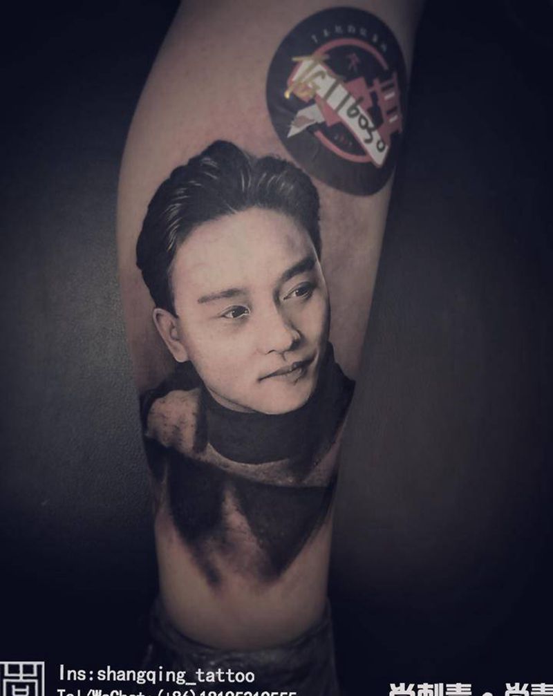 张国荣纹身图片_腿部欧美写实纹身图案