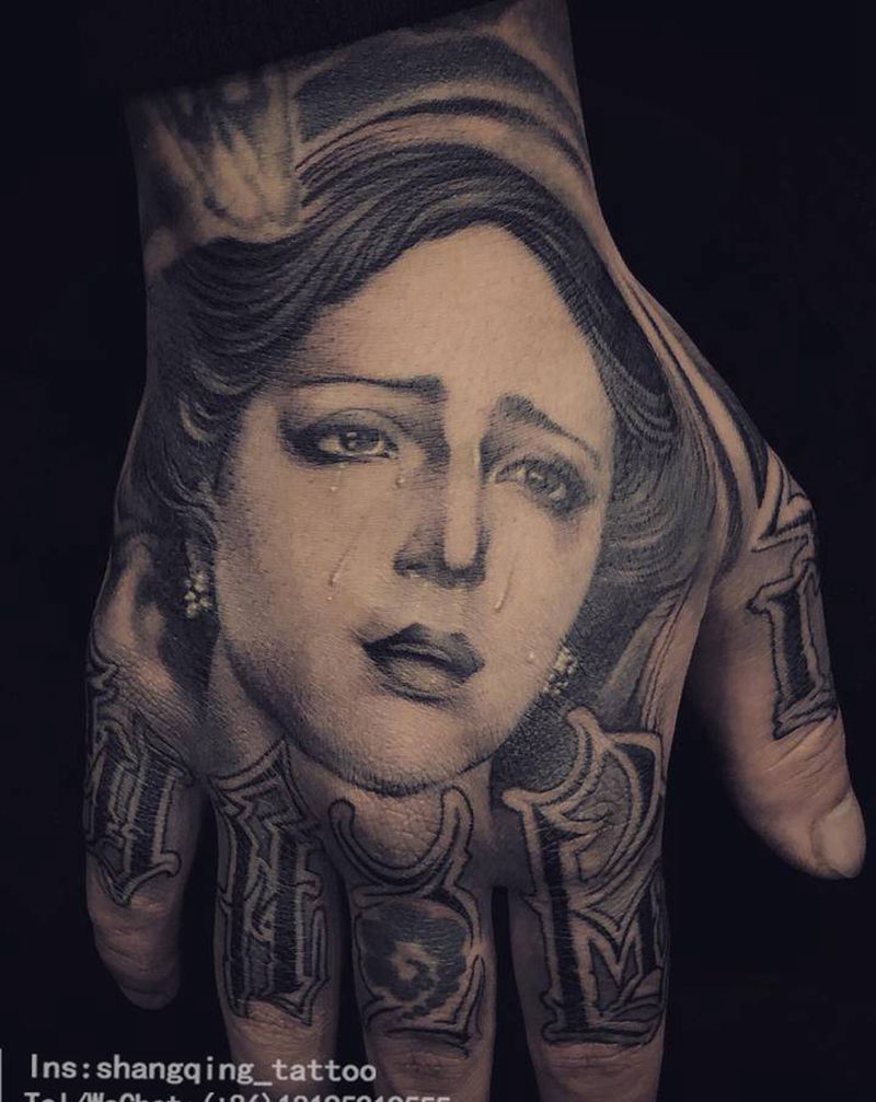 圣母纹身图片_手臂手部欧美写实纹身图案