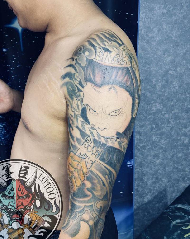 斗战胜佛纹身图片_肩部手臂新传统老传统龙头猴子云雾纹身图案