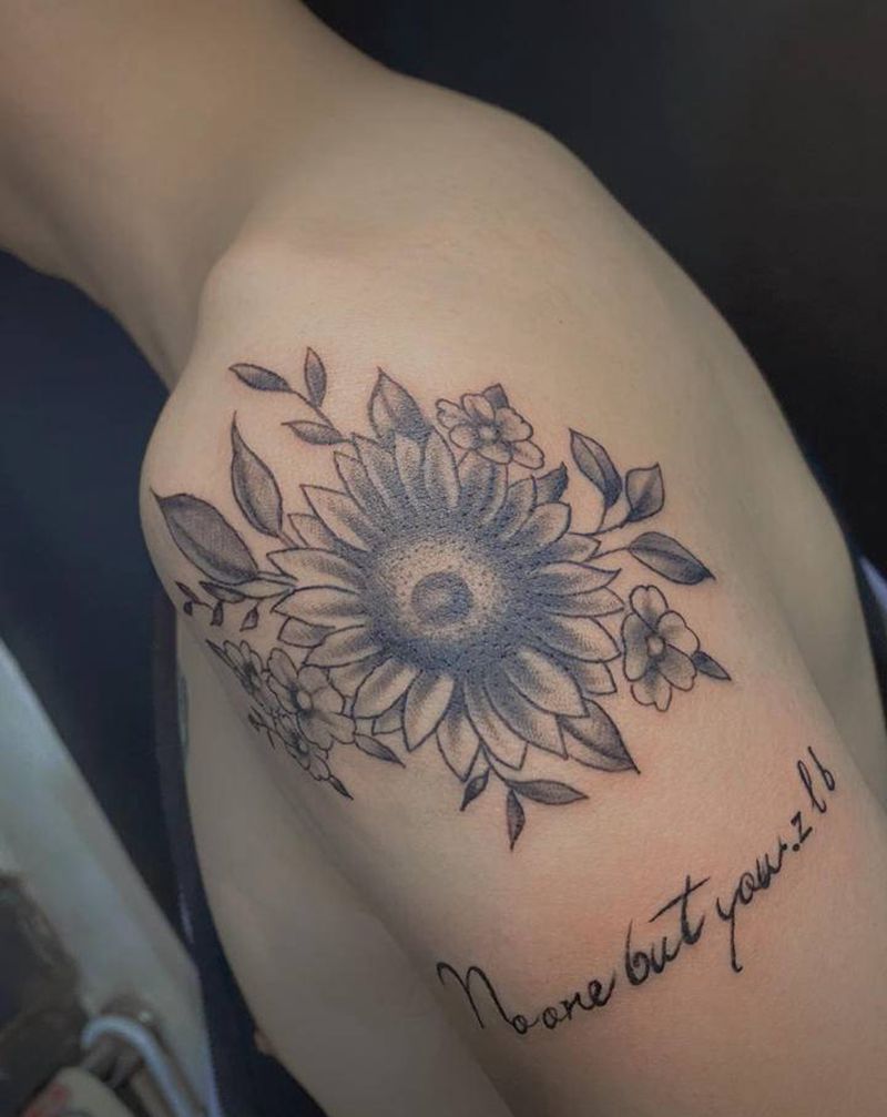 太阳花纹身图片_手臂纹身图案