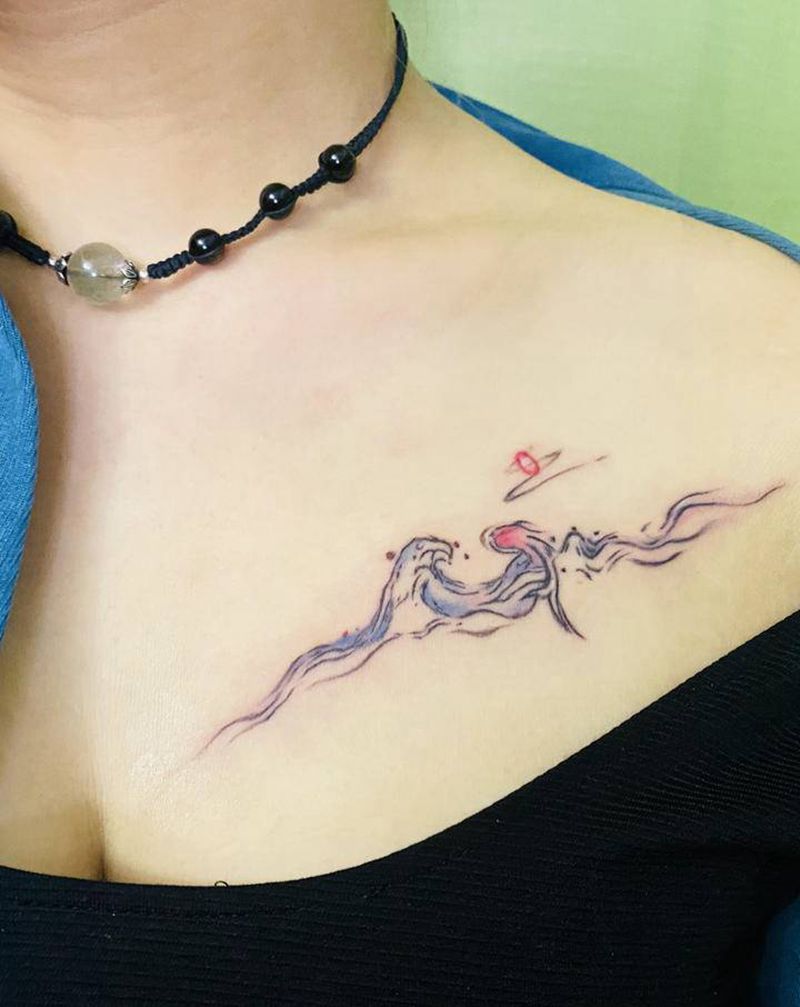 小海浪纹身图片_胸部纹身图案