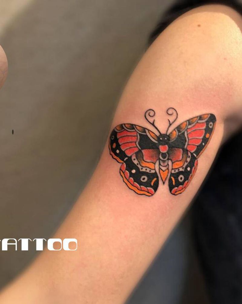 蝴蝶遮盖作品纹身图片_手臂新传统纹身图案