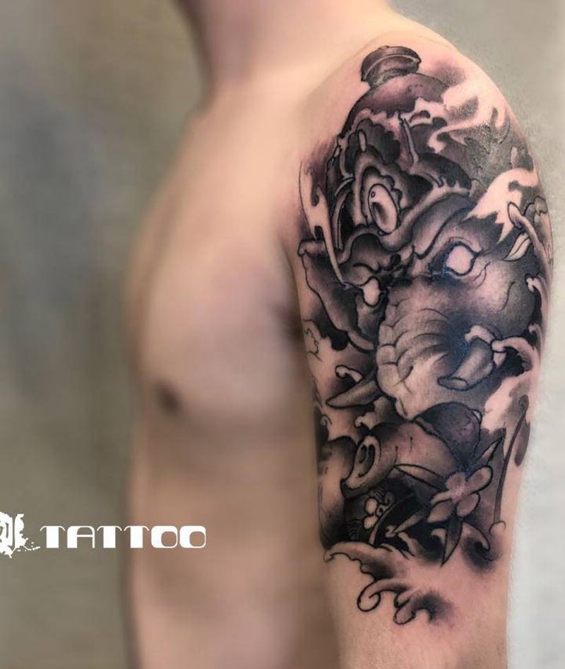 大臂象神纹身图片_手臂新传统纹身图案