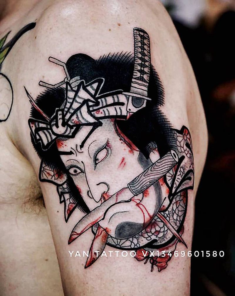 生首纹身图片_肩部老传统纹身图案