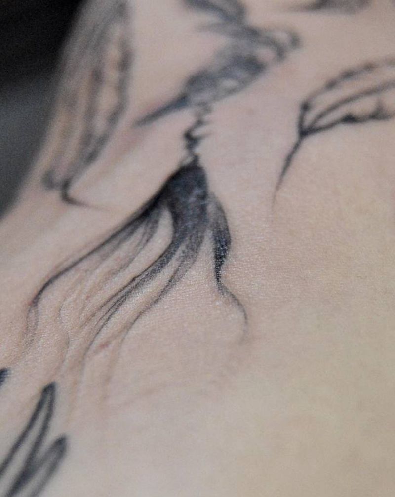 捕梦网未完成纹身图片_手臂纹身图案