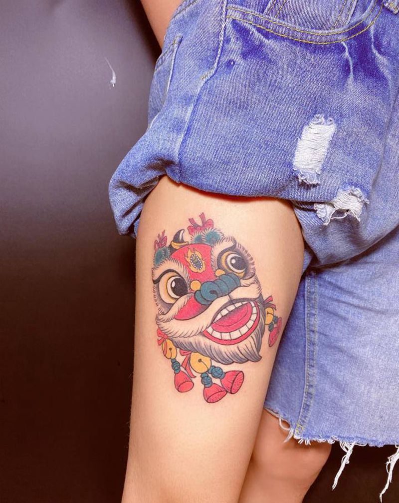 醒狮纹身图片_腿部纹身图案