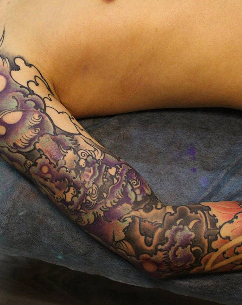 新传统/唐狮纹身图片_手臂新传统纹身图案