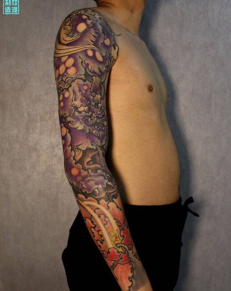 百兽之王 /百花之王纹身图片_手臂新传统纹身图案