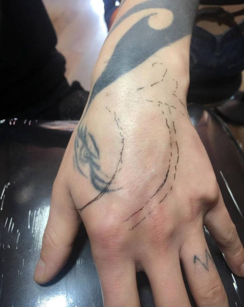手部遮盖纹身图片_手部纹身图案