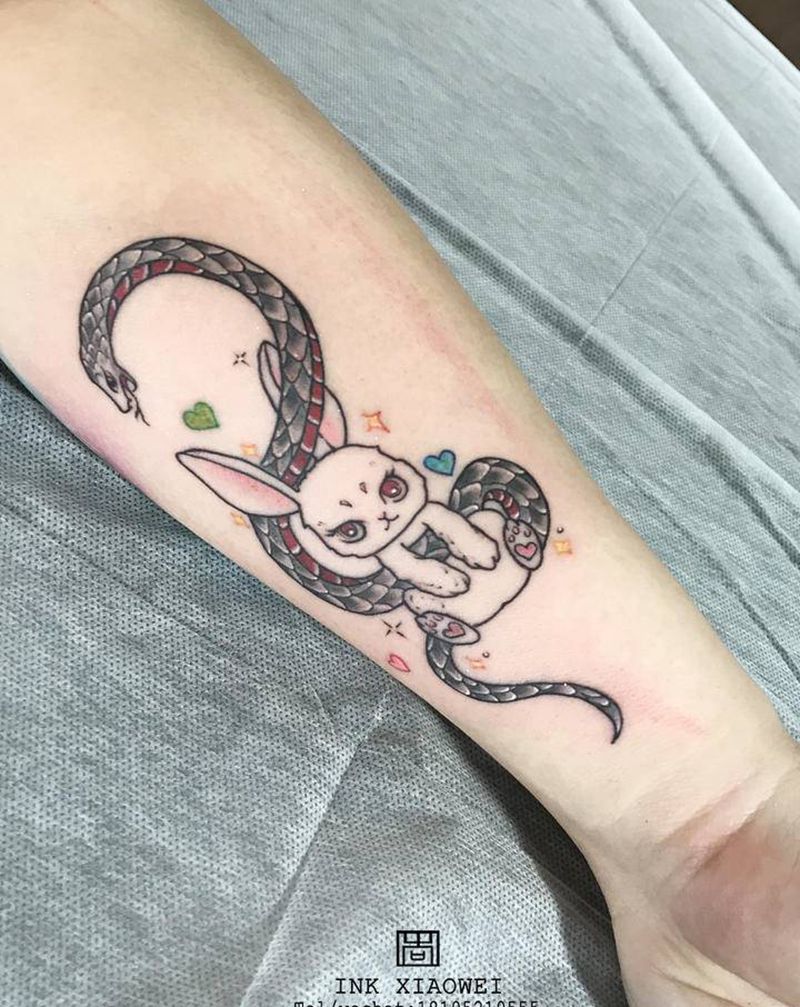 蛇盘兔纹身图片_手臂Old School纹身图案