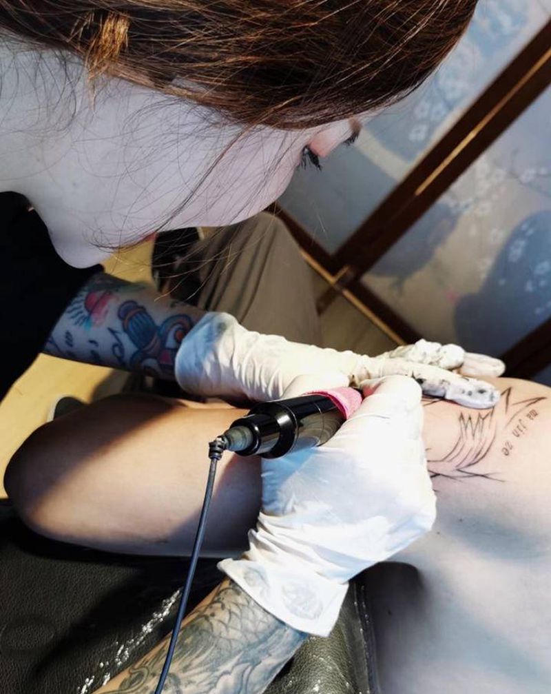 双鱼纹身图片_手臂几何纹身图案