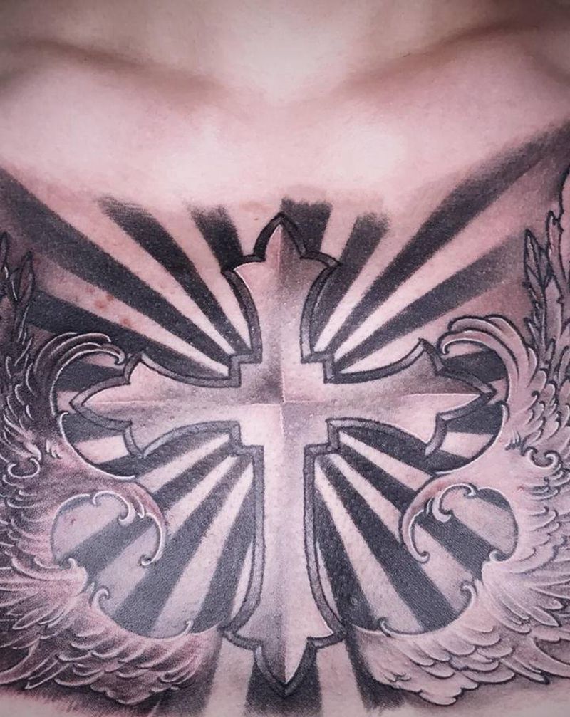 花胸翅膀纹身图片_胸部欧美写实新传统纹身图案