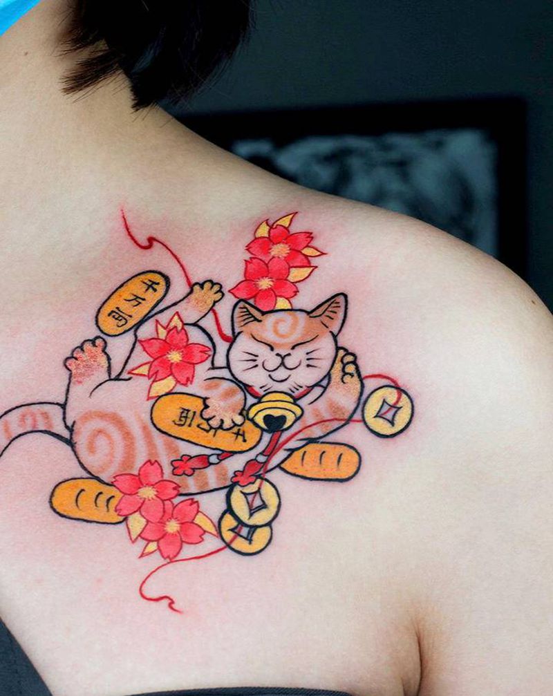 招财猫纹身图片_肩部纹身图案