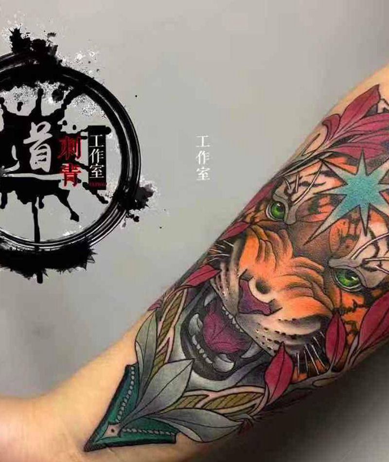 小老虎一枚纹身图片_手臂手部新传统New School纹身图案