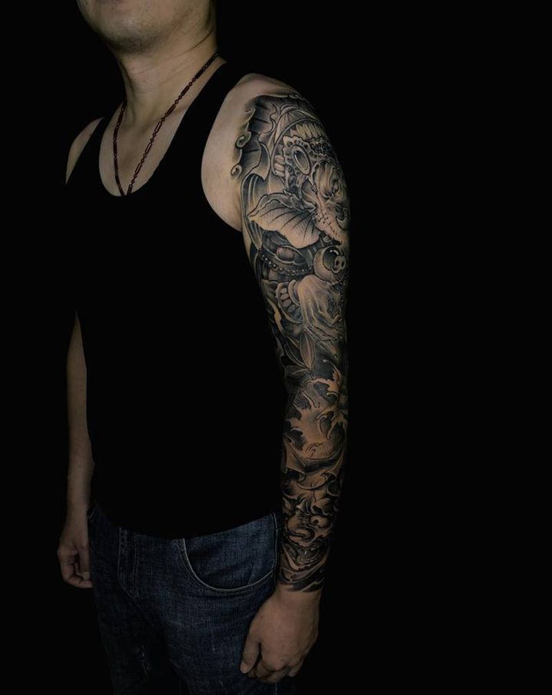 花臂纹身图片_手臂老传统新传统象神般若纹身图案