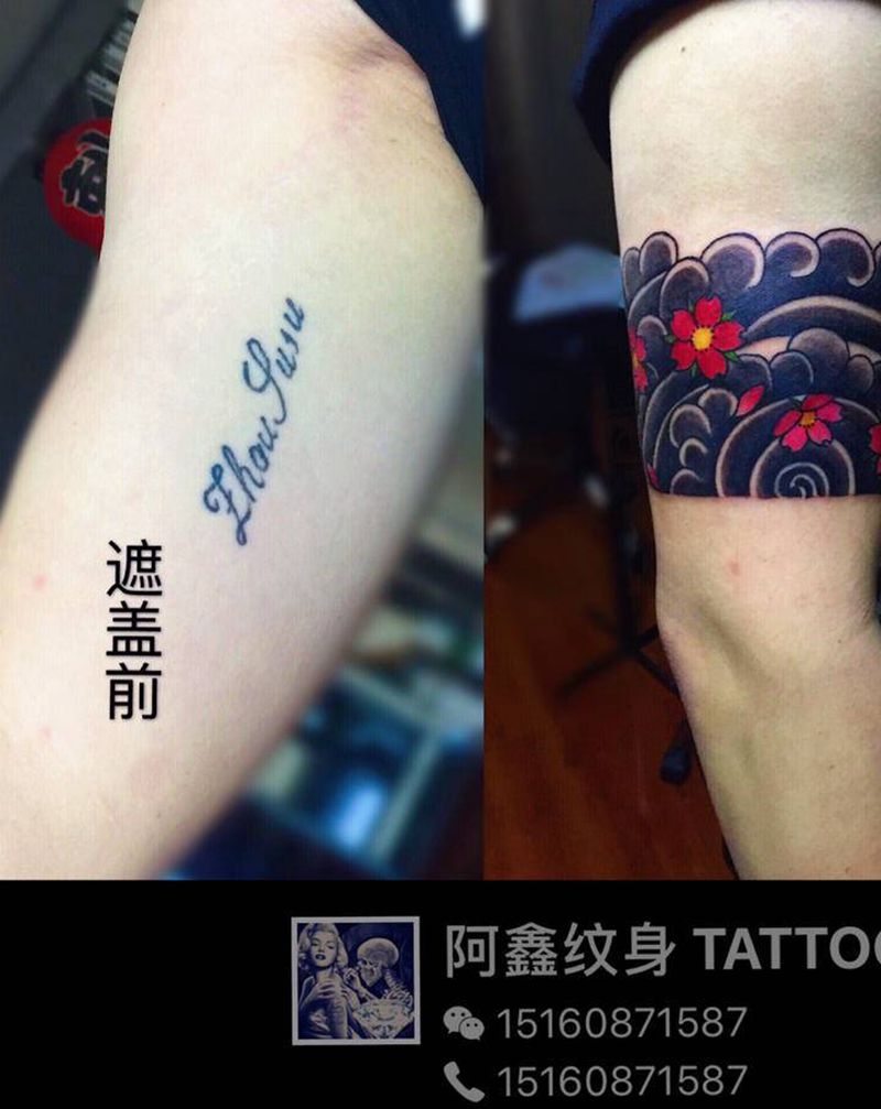 臂环遮盖纹身图片_手臂纹身图案