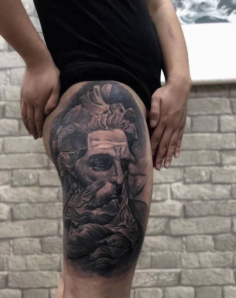 海神波赛冬纹身图片_腿部欧美写实纹身图案