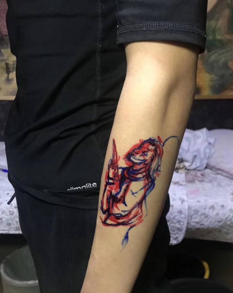 小丑纹身图片_手臂点刺小丑点刺纹身图案