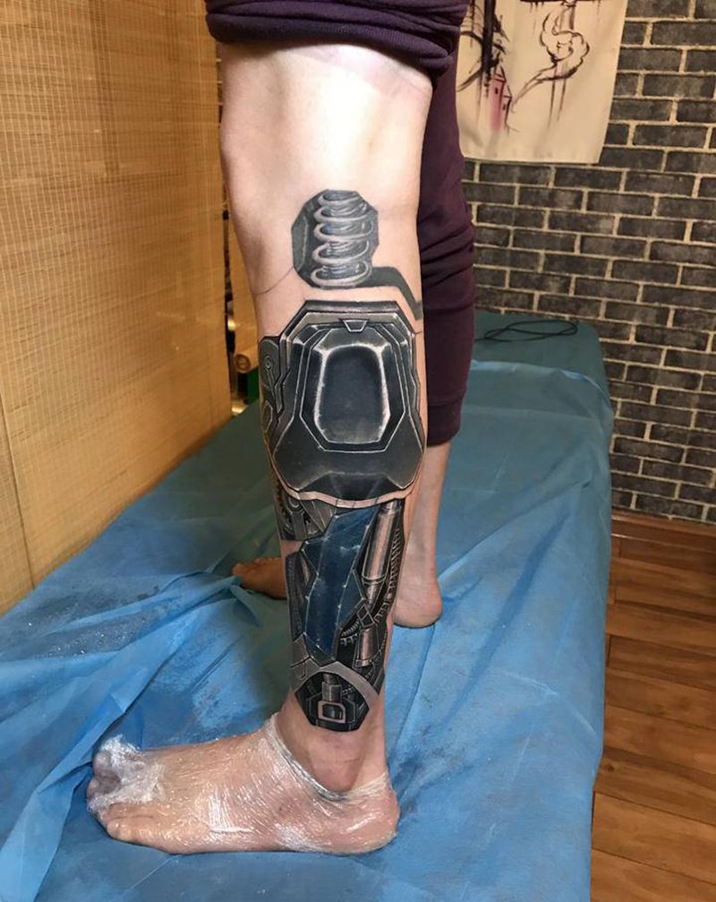 用机械遮盖旧图纹身图片_欧美写实机械纹身图案