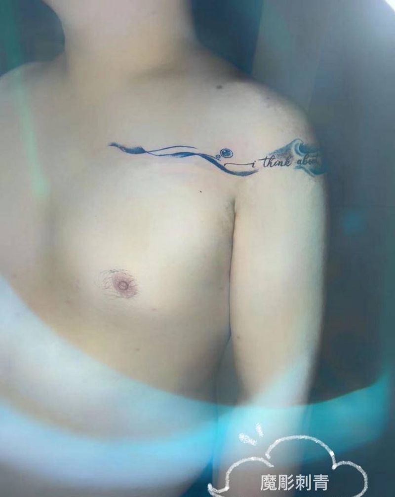 水浪纹身图片_胸部手臂水墨纹身图案