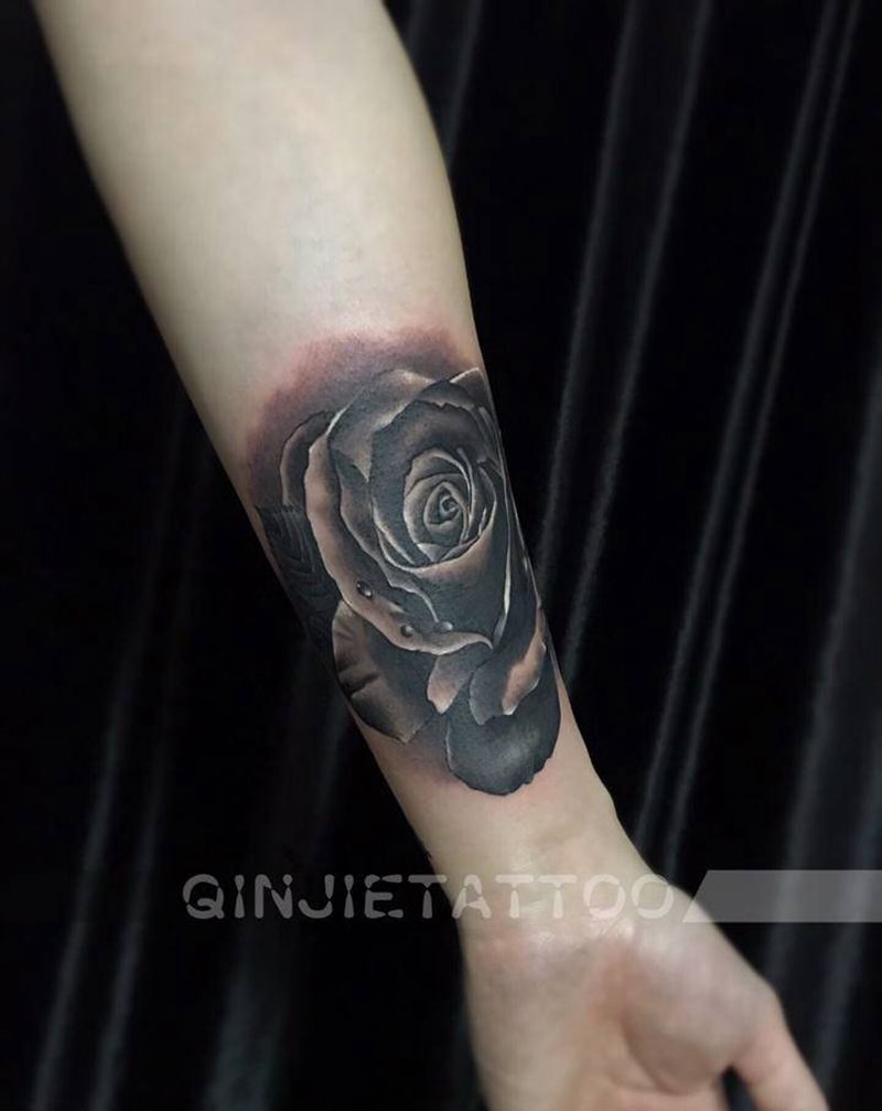 父爱（1）纹身图片_手臂欧美写实玫瑰花纹身图案