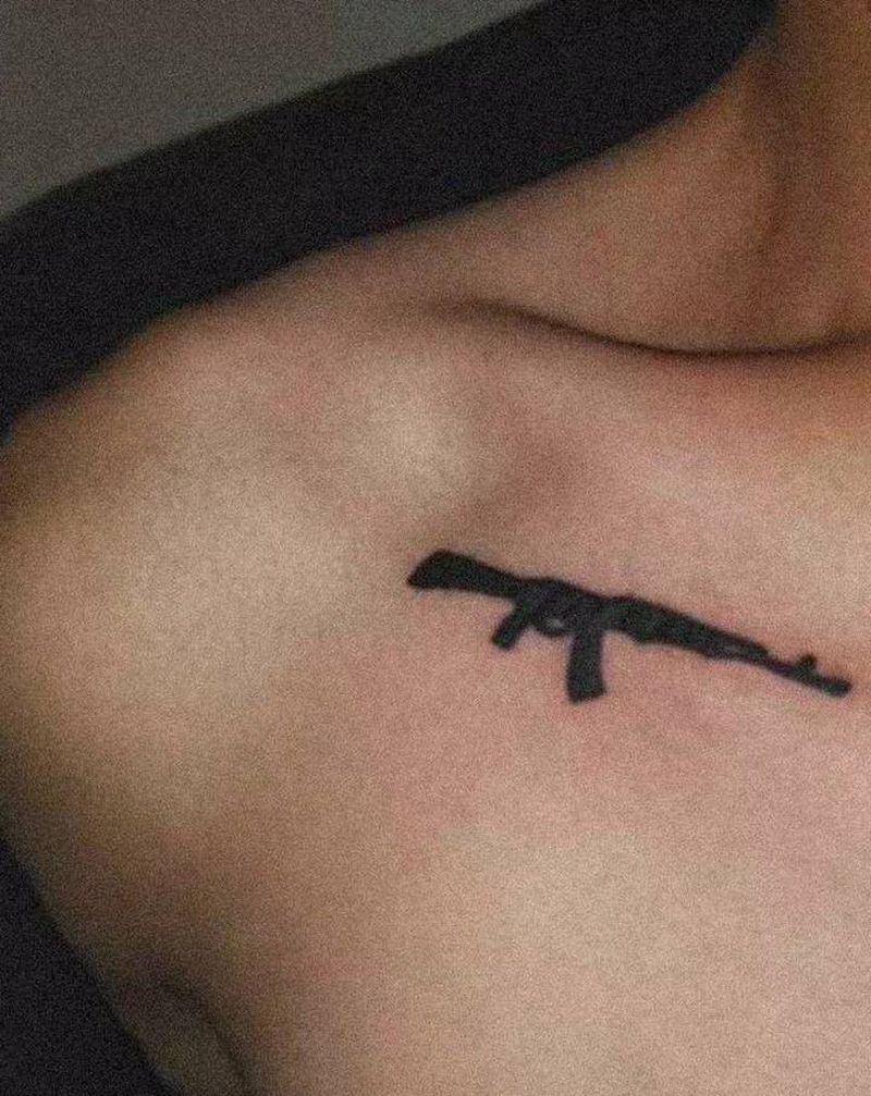 机枪纹身图片_肩部纹身图案