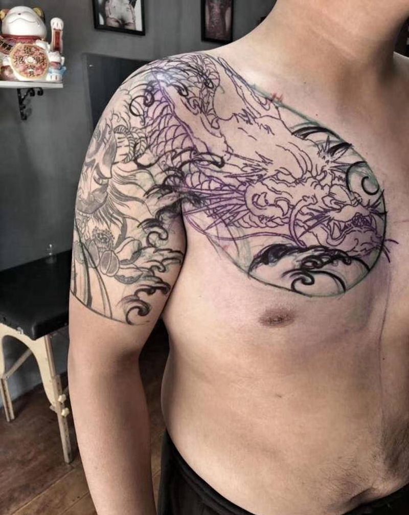 修改接胸口纹身图片_手臂胸部纹身图案