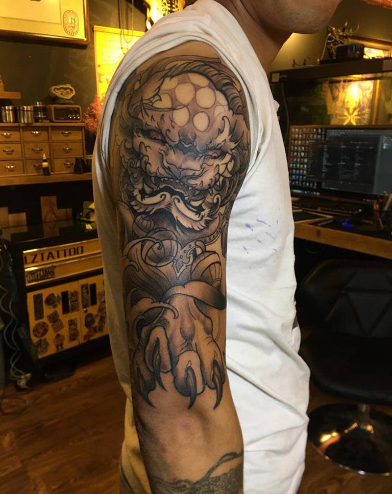 唐狮纹身图片_手臂纹身图案