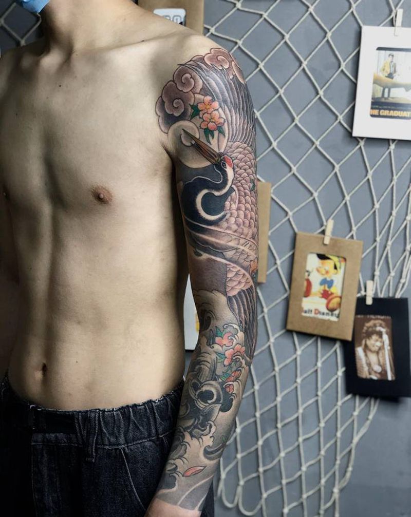 仙鹤花臂纹身图片_手臂新传统纹身图案