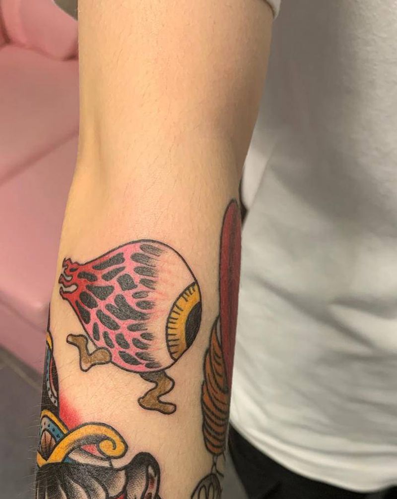 奔跑的眼球纹身图片_手臂Old School纹身图案