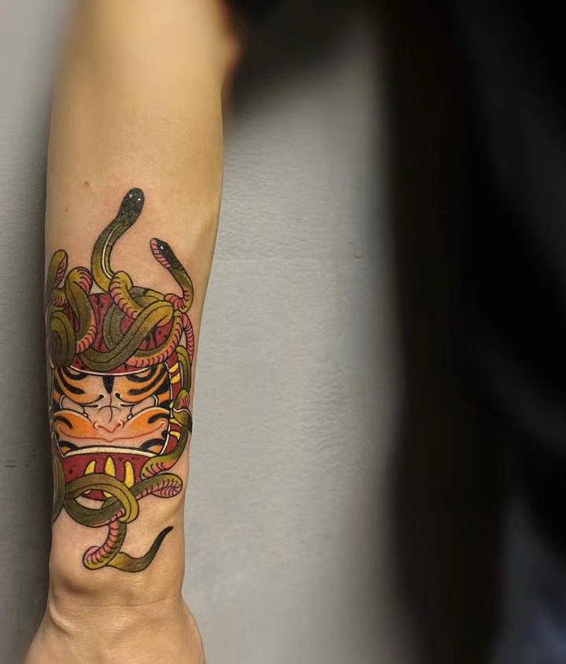 达摩蛋纹身图片_手臂纹身图案