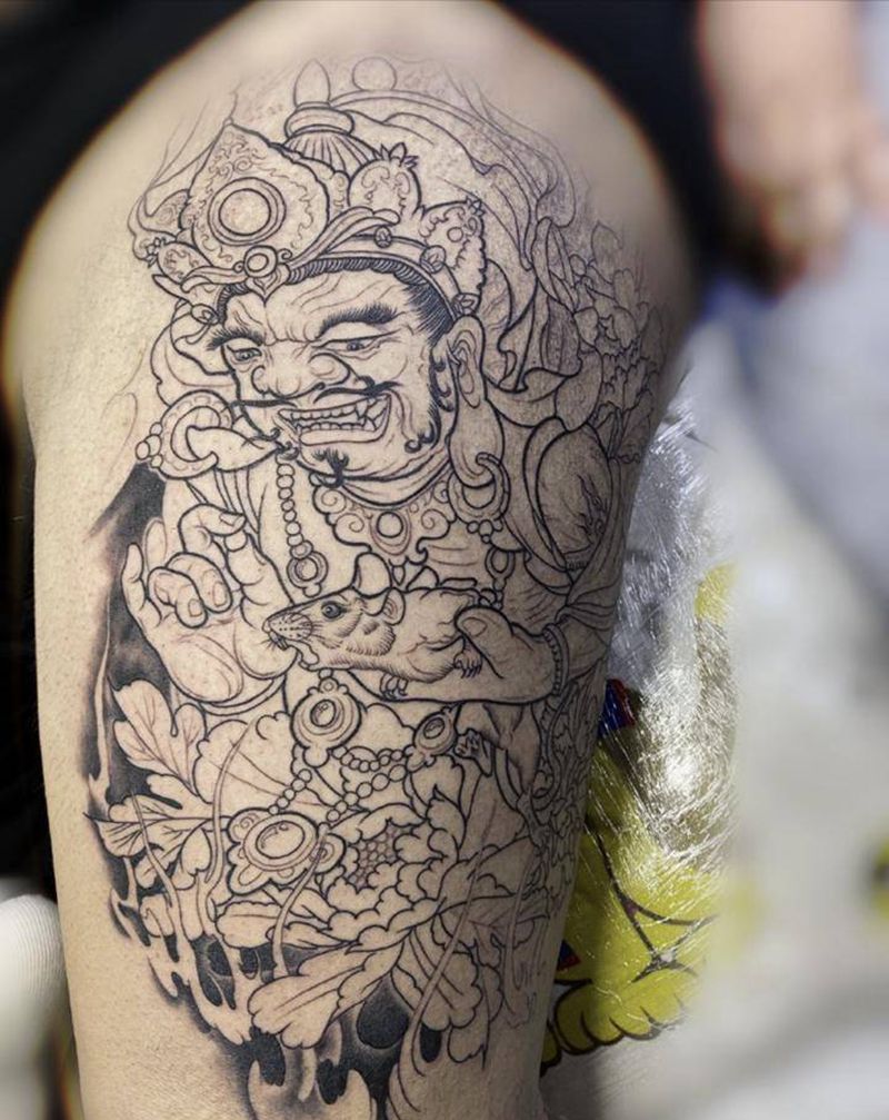黄财神纹身图片_腿部纹身图案