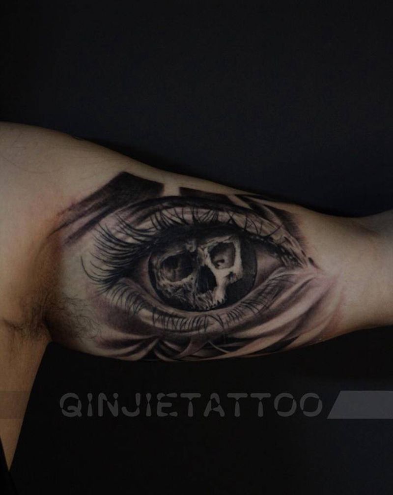 向生纹身图片_手臂欧美写实骷髅眼睛纹身图案