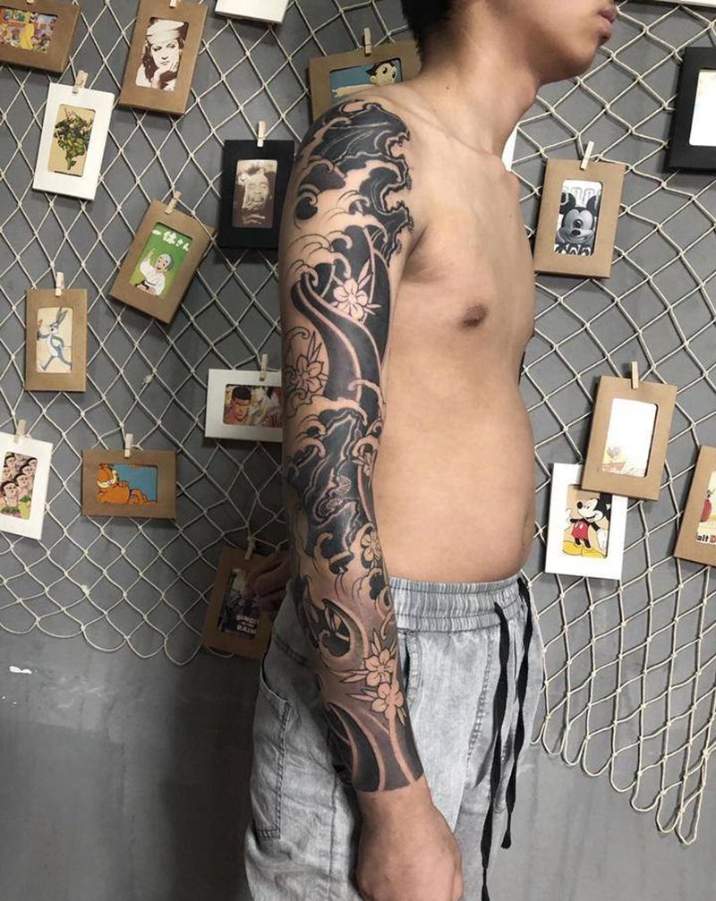 浪臂纹身图片_手臂新传统纹身图案