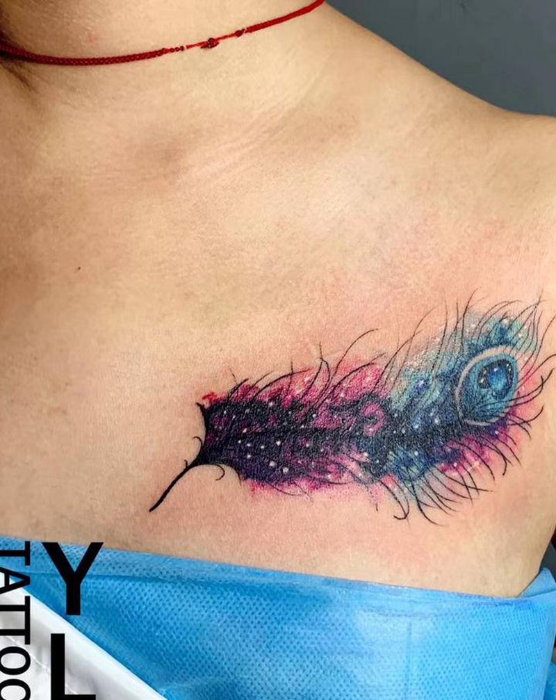 星空羽毛遮盖纹身图片_胸部水彩星空遮盖纹身图案