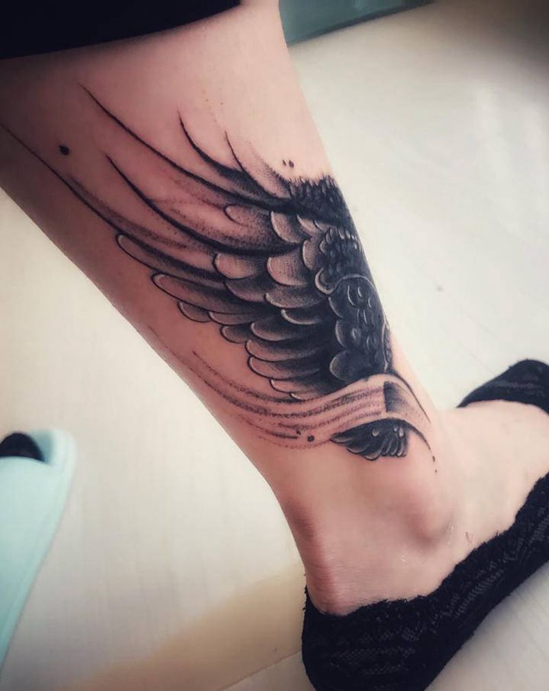 遮盖纹身图片_腿部老传统遮盖翅膀纹身图案