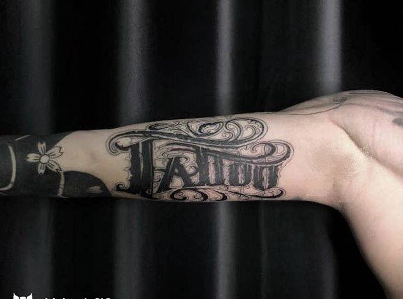 TATTOO纹身图片_手臂花体字纹身图案