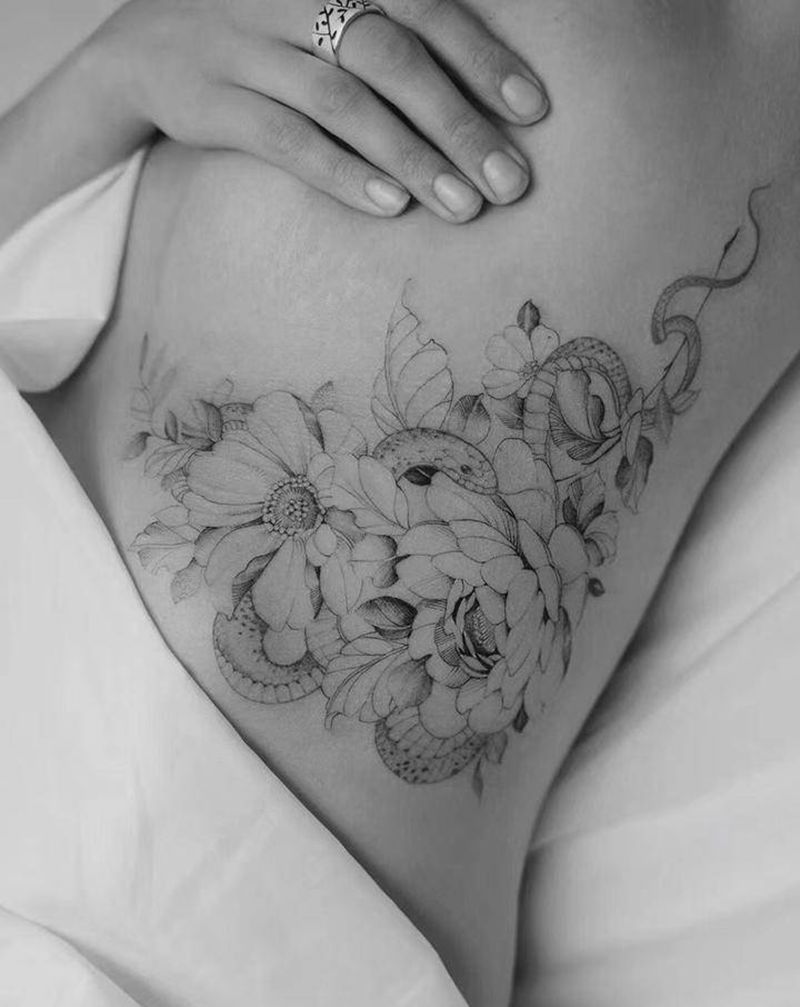 花纹身图片_腰部纹身图案