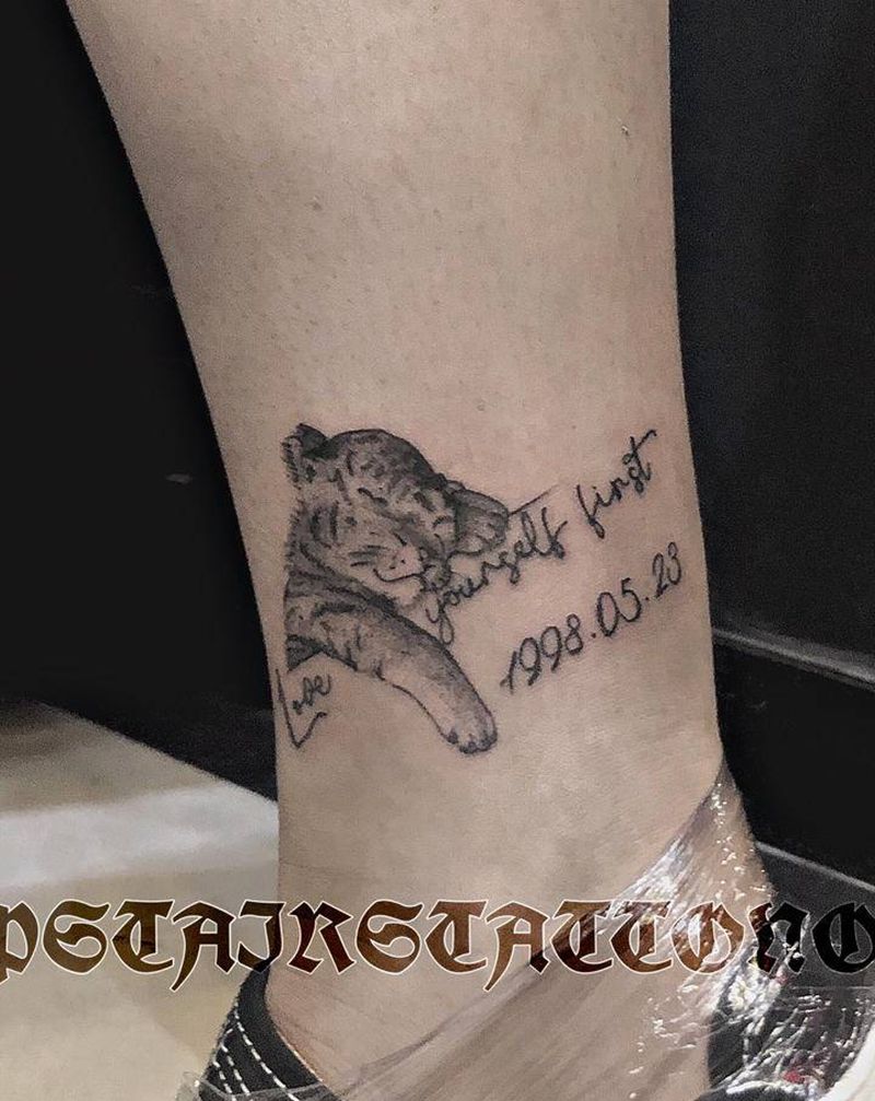 小老虎纹身图片_腿部纹身图案