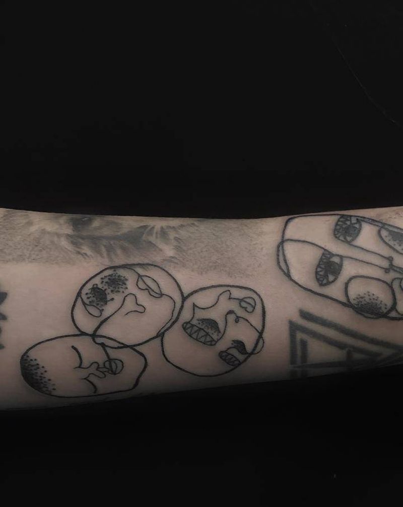 怪诞纹身图片_手臂纹身图案