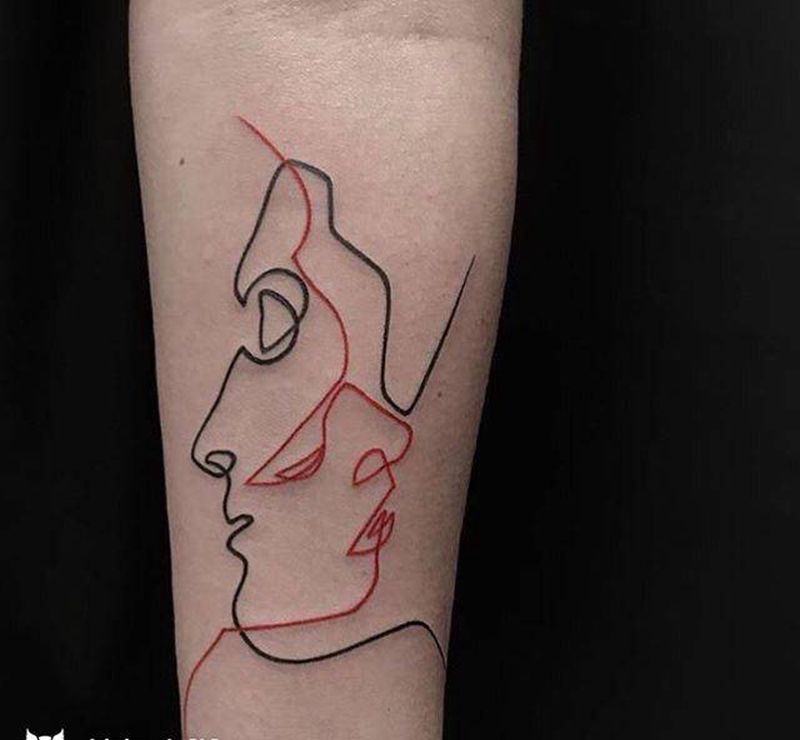 双面纹身图片_手臂纹身图案