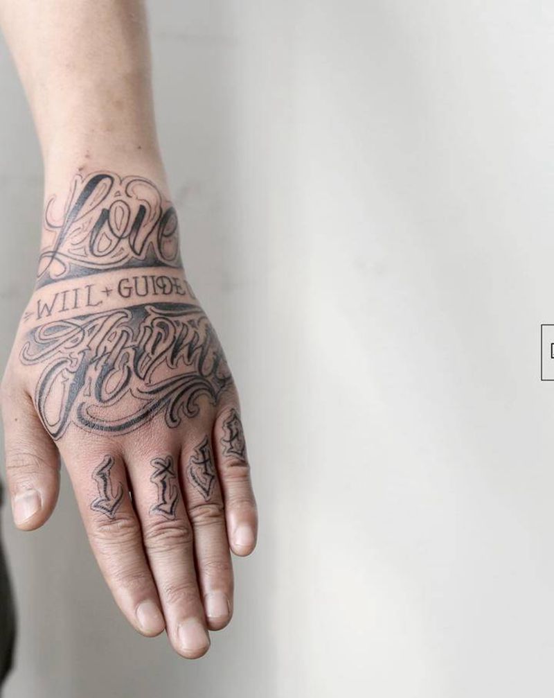 花体字纹身图片_手部花体字纹身图案
