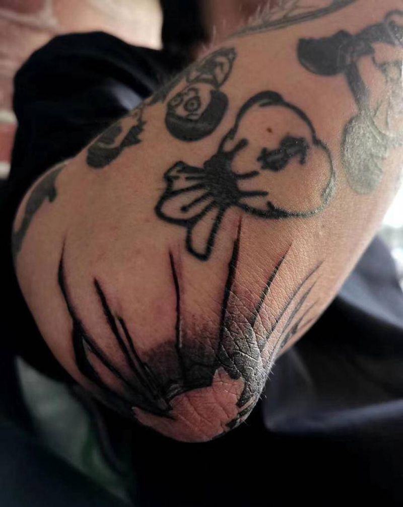 破碎玻璃爆肘纹身图片_手臂Old School纹身图案