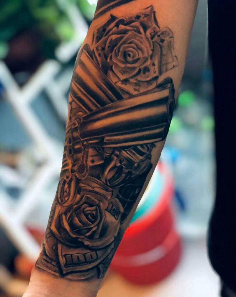 枪泡玫瑰？纹身图片_手臂欧美写实纹身图案