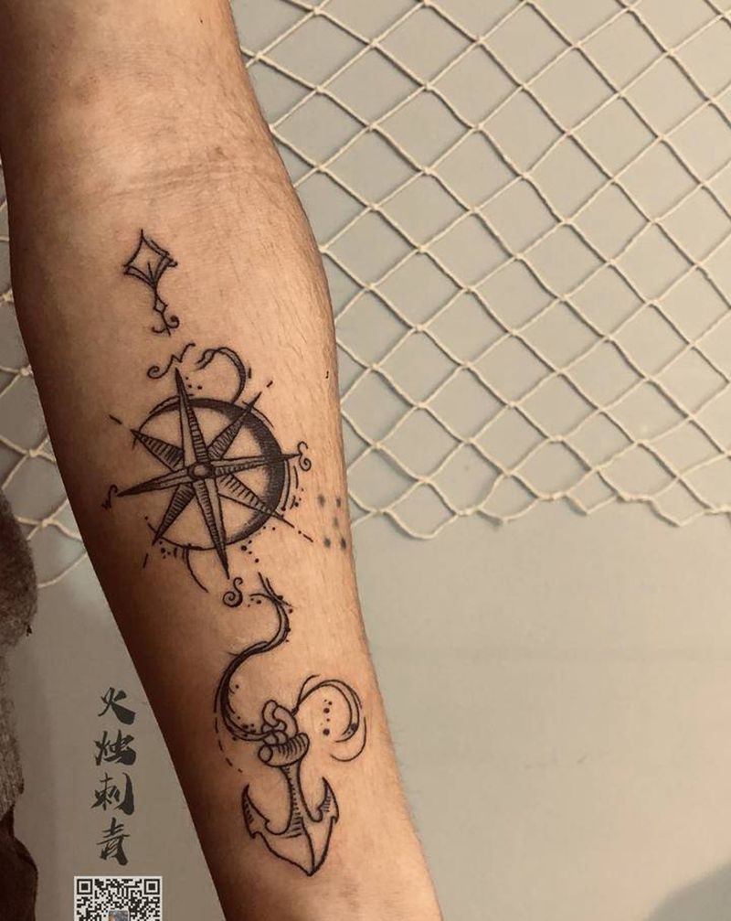 “指南针”纹身图片_手臂纹身图案