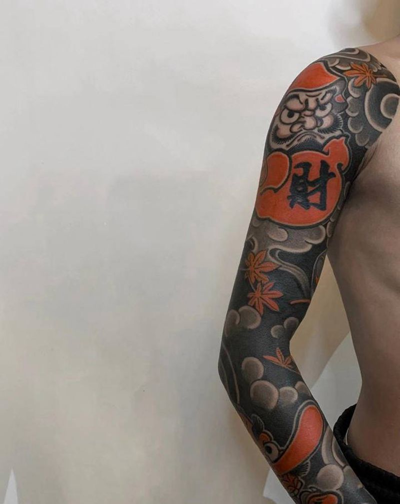 达摩蛋天狗纹身图片_手臂老传统天狗达摩蛋枫叶纹身图案